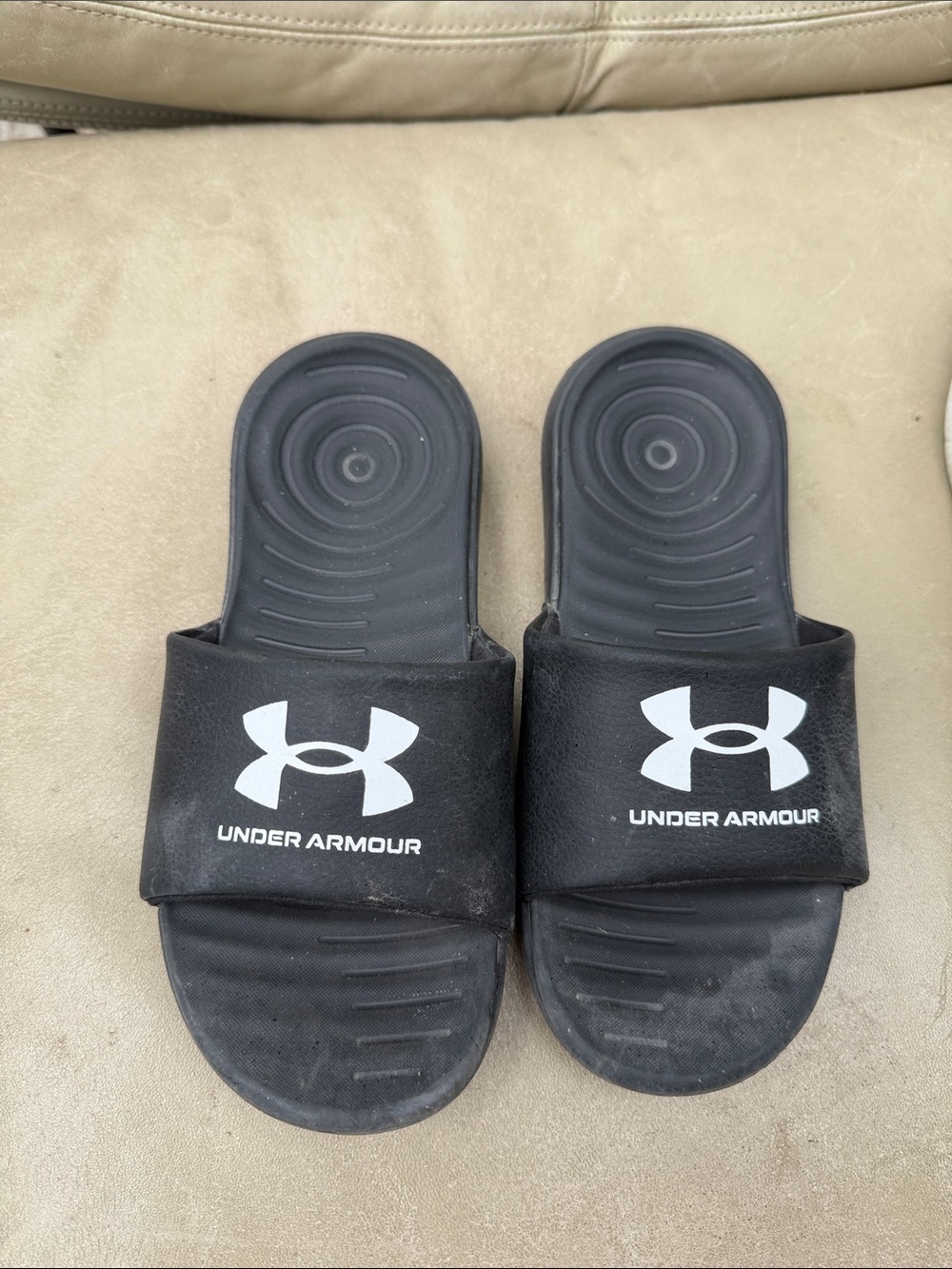 Used kids size 3 Under Armour Black Slides with White Logo good condition boys